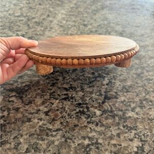 Round rustic wooden riser